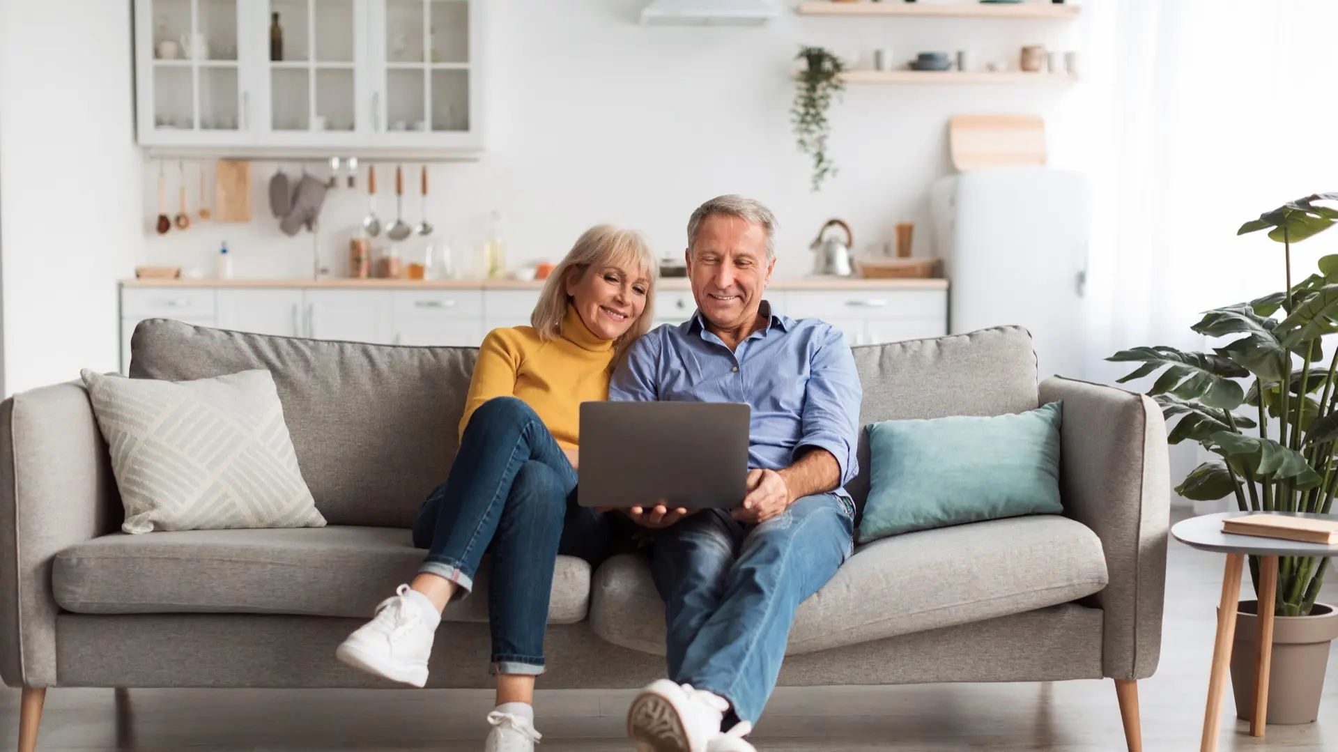 Couple browsing fireplace options in a showroom